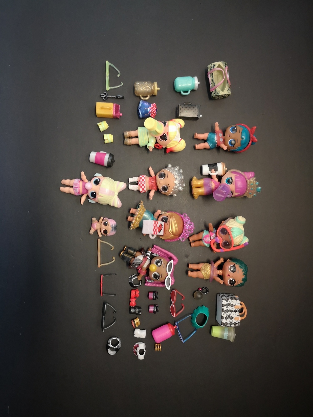 L.O.L. Surprise! Dolls Collection of 9 with Accessories & 1 Mini Lil Sister